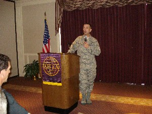 Col. Jim Appleyard, USAF, chapter president, welcomes the attendees and introduces the speaker for the October chapter luncheon. 